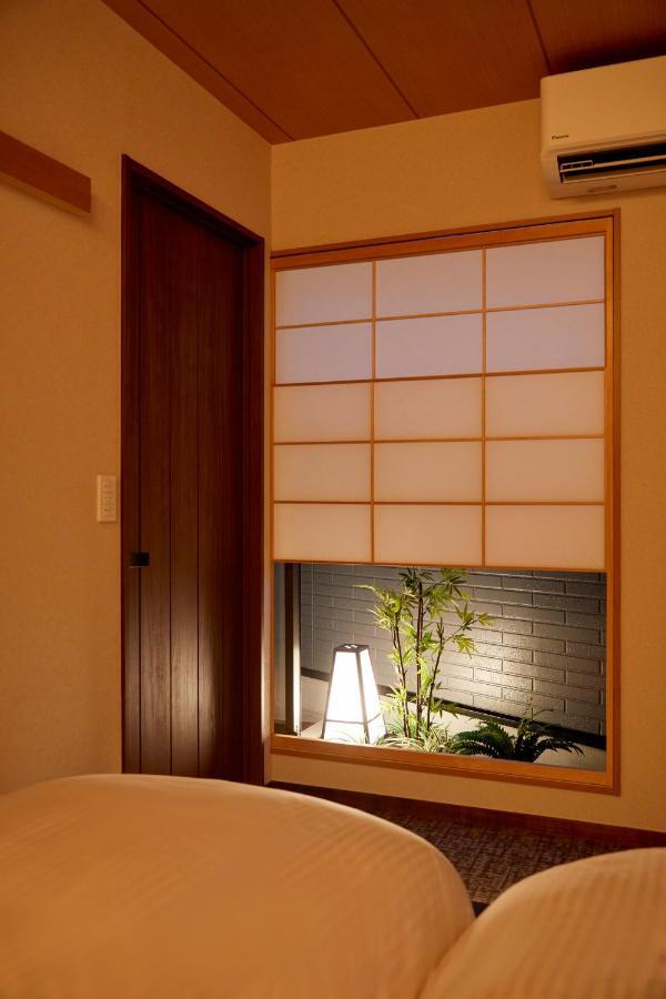 古今 天下茶屋 With A Private Parking Lot And A Half Open-Air Bath And Direct To Kix Villa Osaka Dış mekan fotoğraf